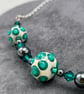Cream and emerald green lampwork glass Swarovski Crystal and haematite necklace - Image 2