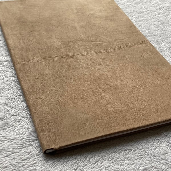 A4:  Softcover beige coloured leather bound A4 sized Fill In The Date Diary