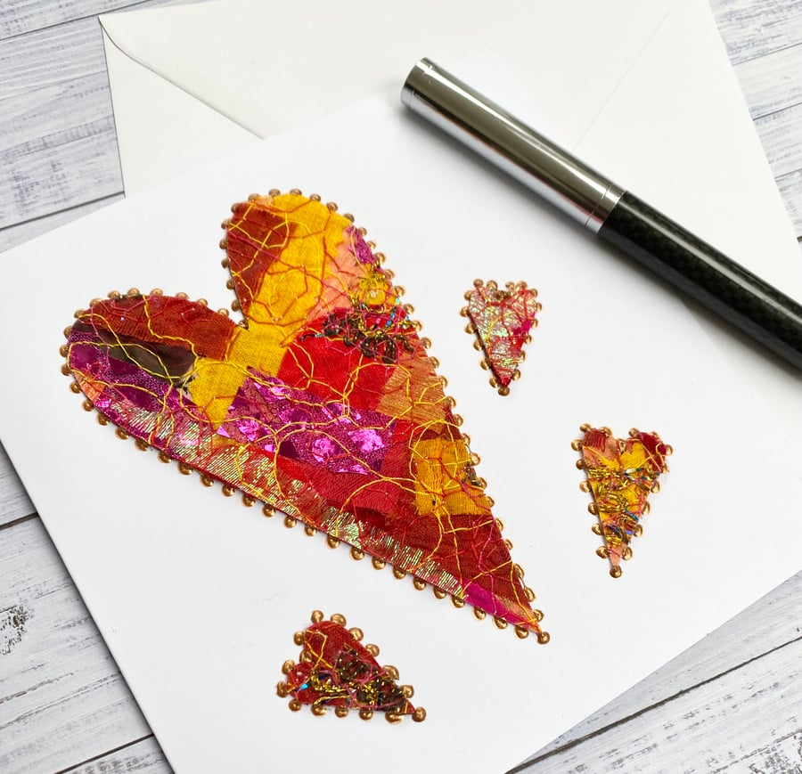 Up-cycled handmade fabric embroidered heart card. 