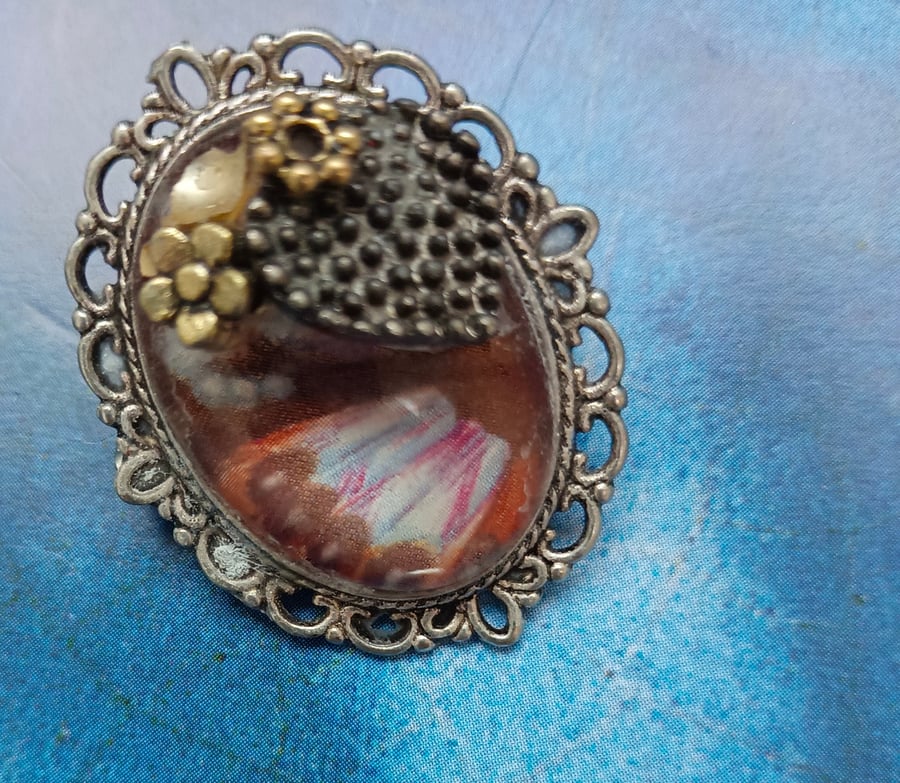 Oval Vintage Style Brooch with an Embellished Glass Cabochon 