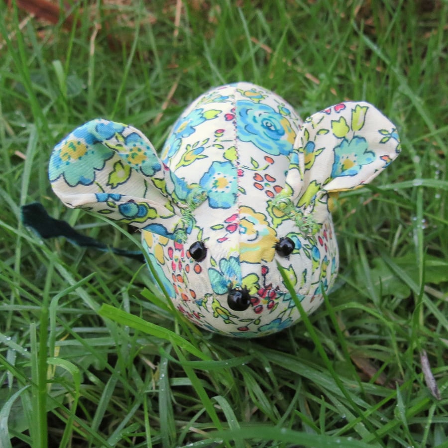 A Liberty Lawn fieldmouse pin cushion. 