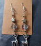 Wintry beaded star and leaf dangle earrings with silver stag charm  - Image 6