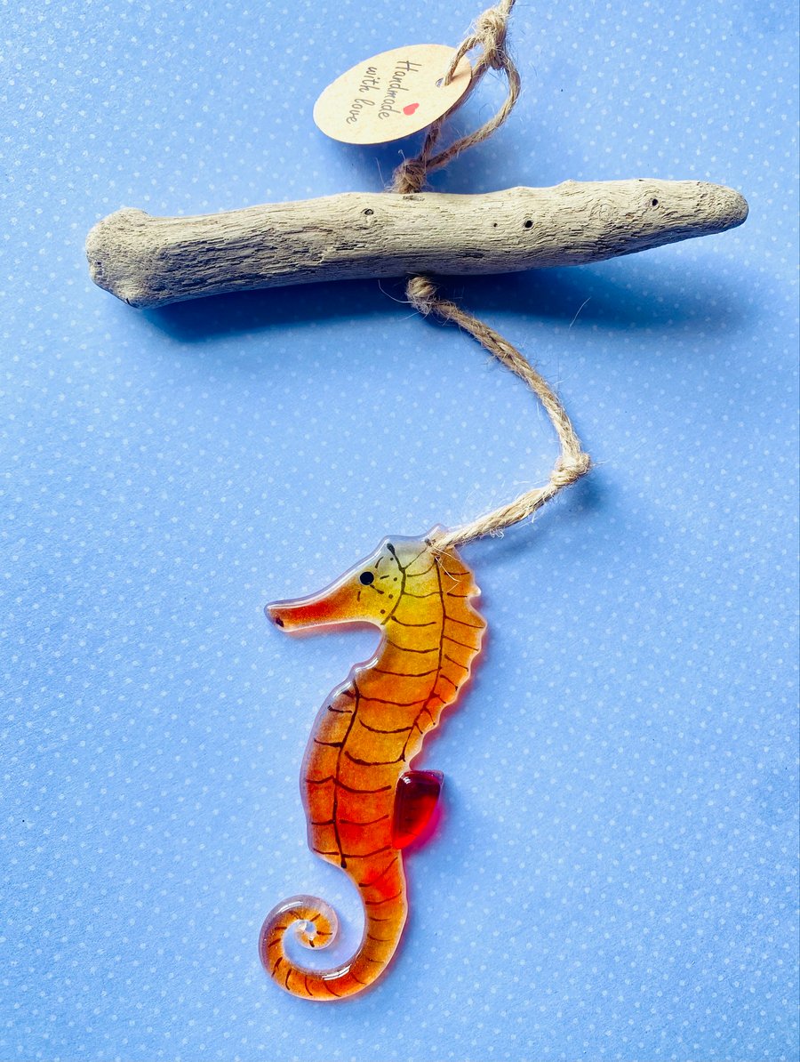 Red  seahorse decoration made of fused glass hanging sun catcher from driftwood 