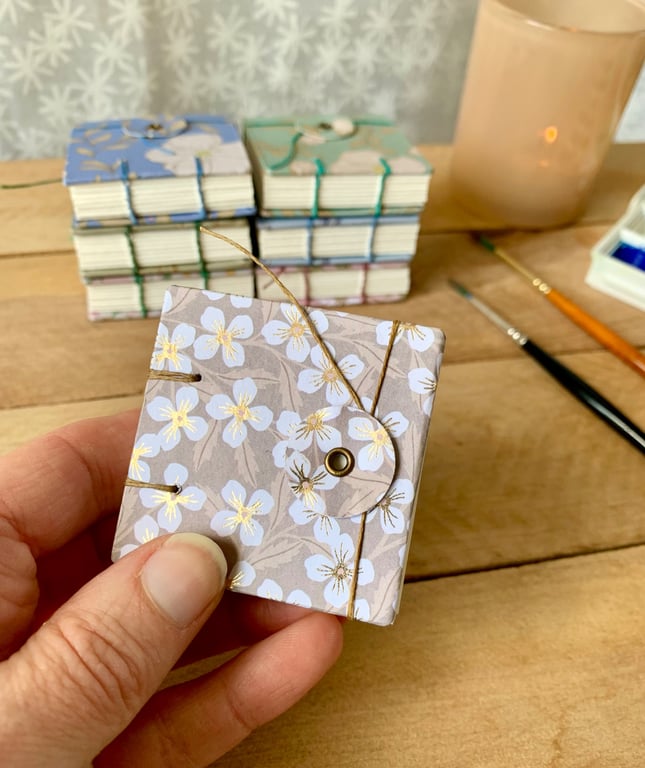 Coptic Bound Tiny Floral Watercolour Sketchbook. Beige, white and gold.