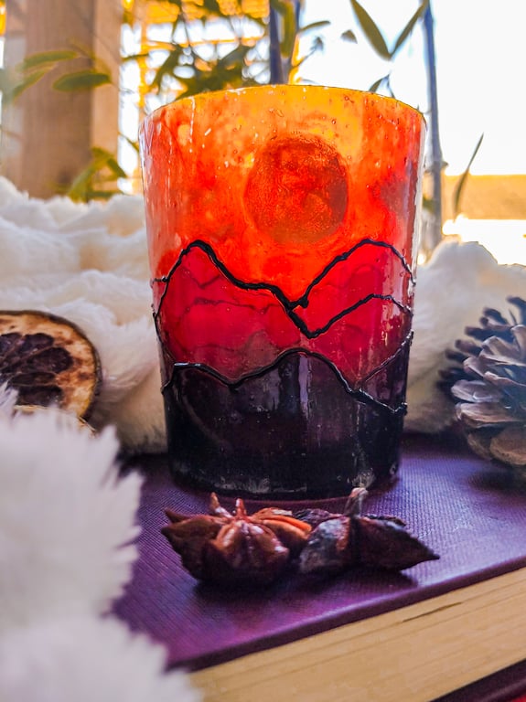 Handmade stained glass effect lantern candleholder with sunset over mountains
