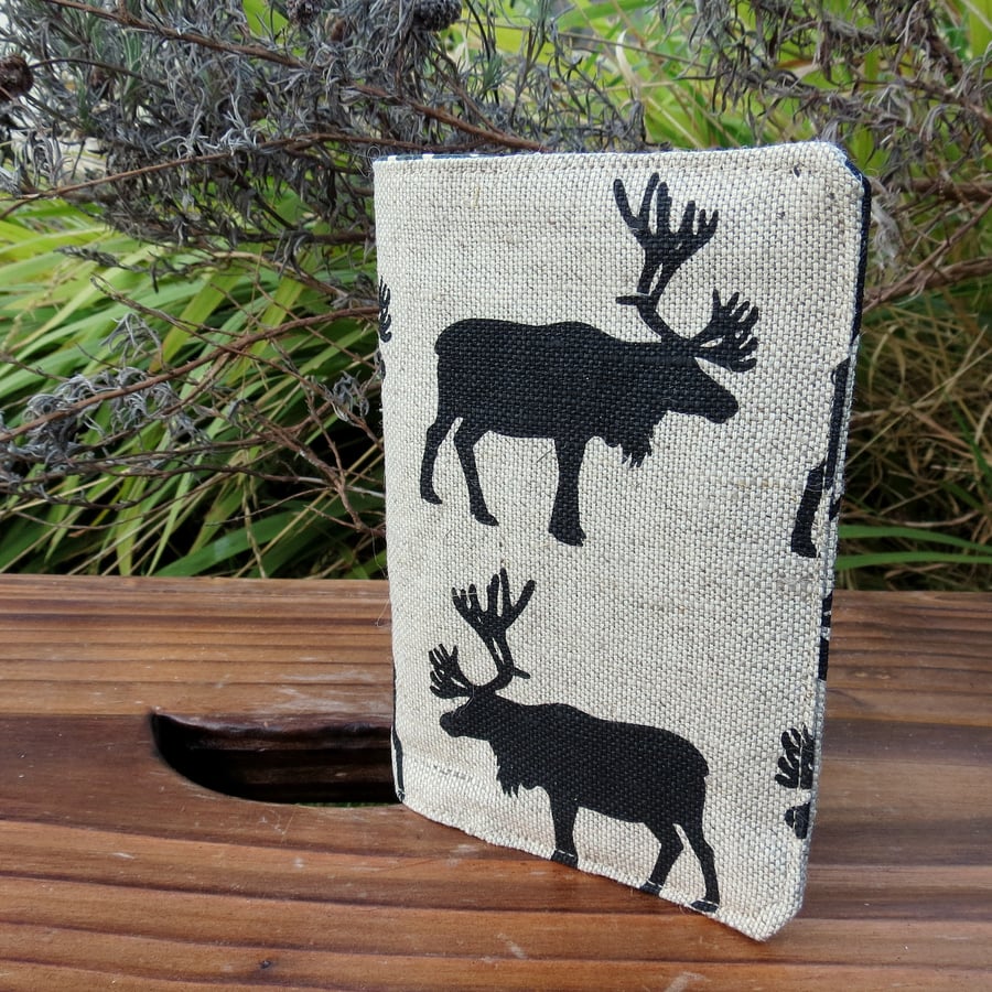 Marching moose. A linen passport cover with a moose design. Passport sleeve.