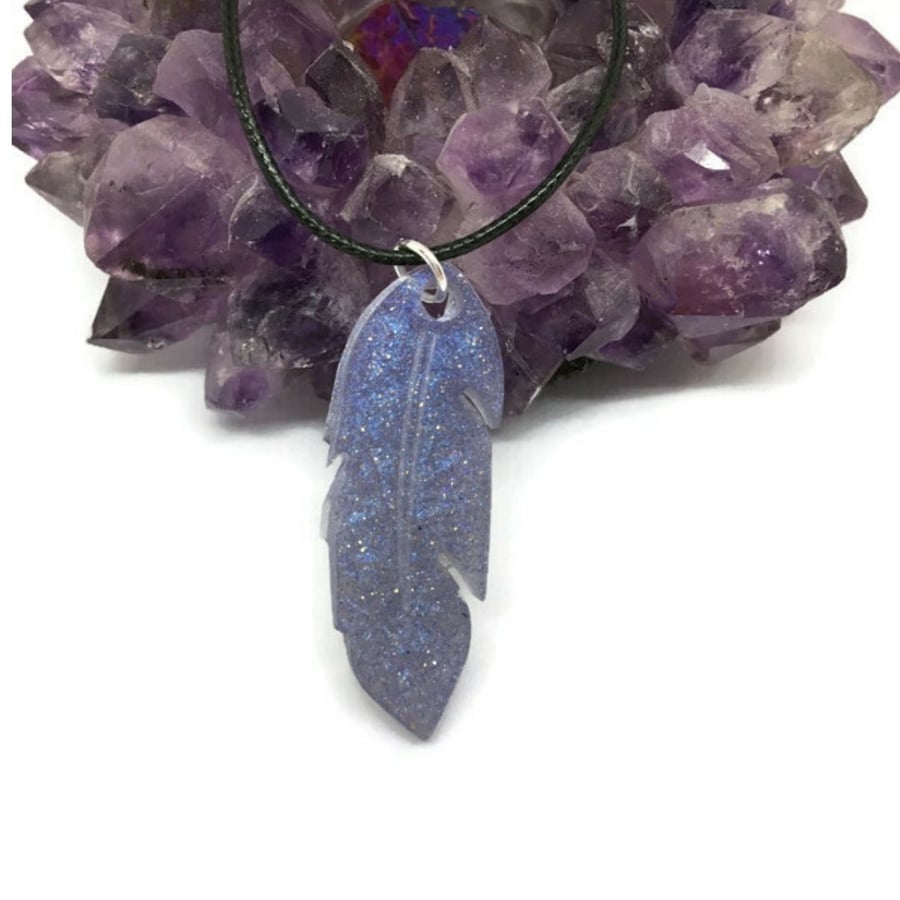 Feather lavender blue sparkle resin pendant with necklace.