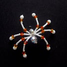 Beaded Christmas Spider Decoration. AB Tangerine & White Christmas Spider