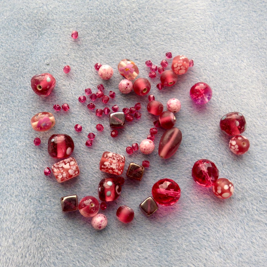 Assorted deep pink beads