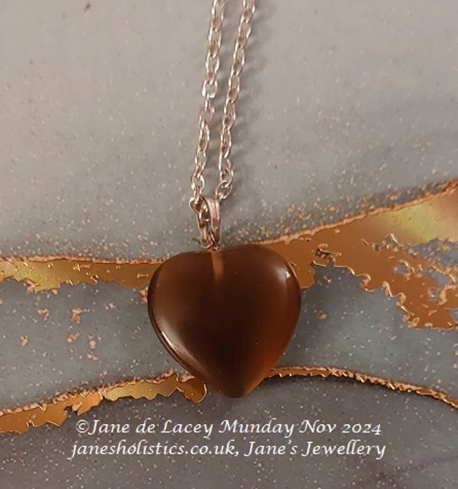 Cats Eye Heart Pendant on Silver Chain.
