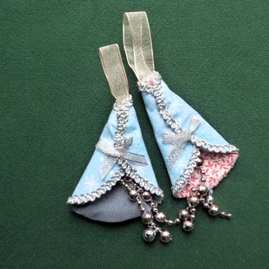 2 stitched textile hanging decorations