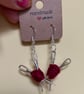 Needle & yarn dangle earrings - Image 1
