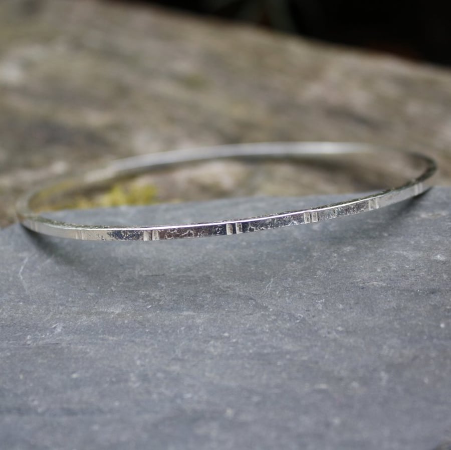 Silver bangle Notched