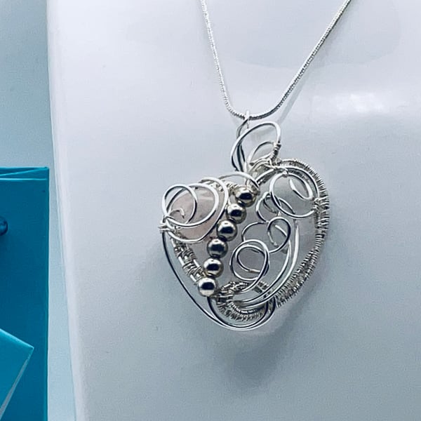 Dreamy rose quartz silver heart pendant