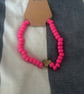 pink bracelet
