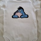 baby grow, vest with eyore from the pooh bear series with space for name