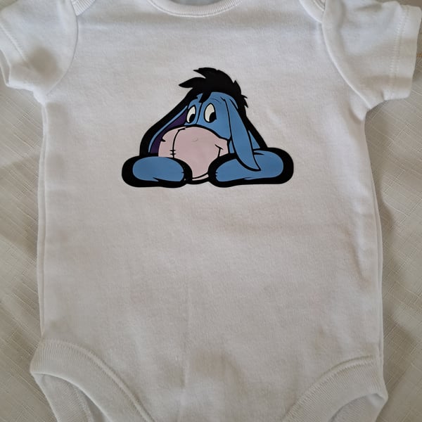 baby grow, vest with eyore character from the pooh bear series 