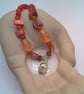 Silver Skull Pendant on an Orange Red Purple & Pink Shell Beaded Necklace - Image 5
