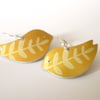 Bird earrings in yellow with leaf print