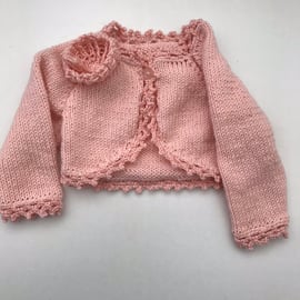 Bolero style cardigan with a crocheted edging