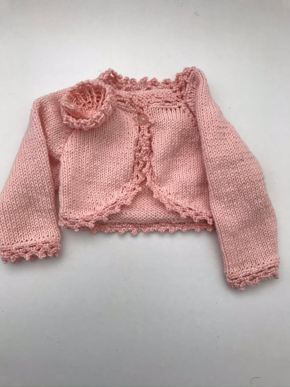 Bolero style cardigan with a crocheted edging