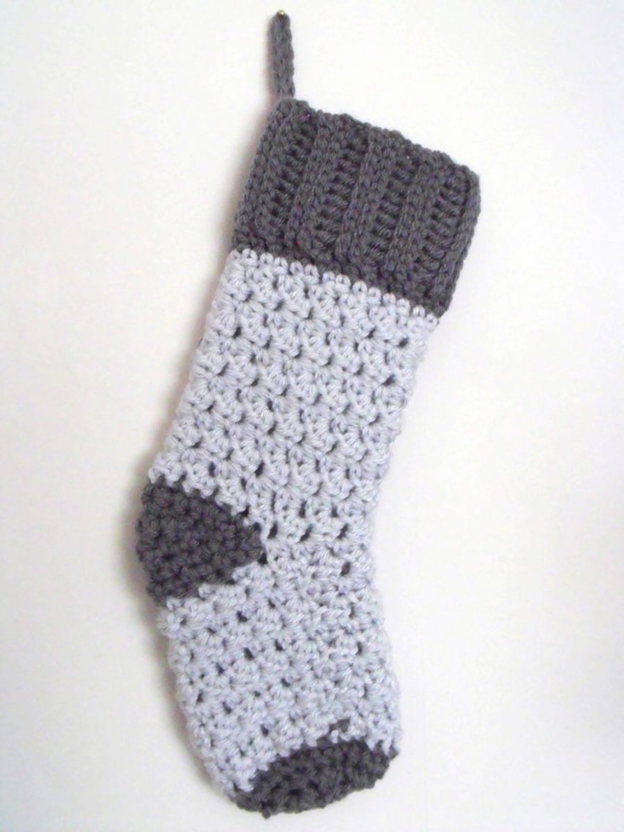 crocheted christmas stocking in grey
