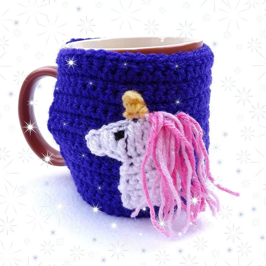 Purple hand crocheted mug cosy with white unicorn with pink sparky mane 