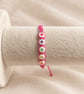 Children's Pink Macramé Bracelet with Colourful Flower Beads – Adjustable - Image 2