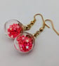 Glass Christmas bauble earrings - pink stars - Image 1