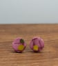 Swirly pink with yellow and green detail studs - Image 1