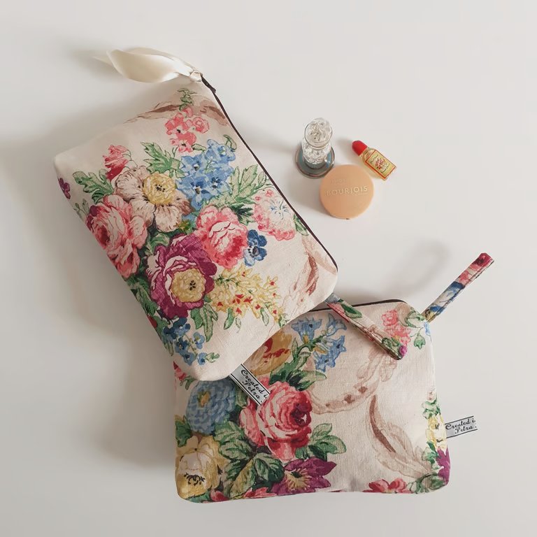 Make up cosmetics or toiletries bag upcycled in a vintage roses print fabric