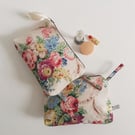 Make up cosmetics or toiletries bag upcycled in a vintage roses print fabric