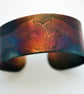 Surgical steel Lynx Cuff, multicolured finish, medium - Image 1