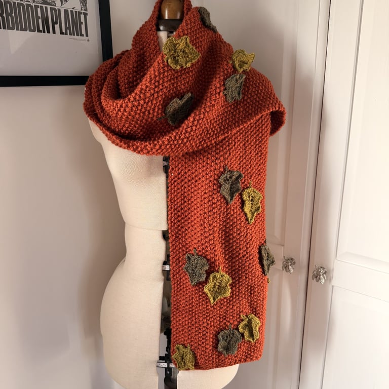 Hand knitted scarf with leaf details