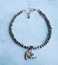 Stretching Yoga Cat Bracelet with Small Silver Glass Beads - Image 5