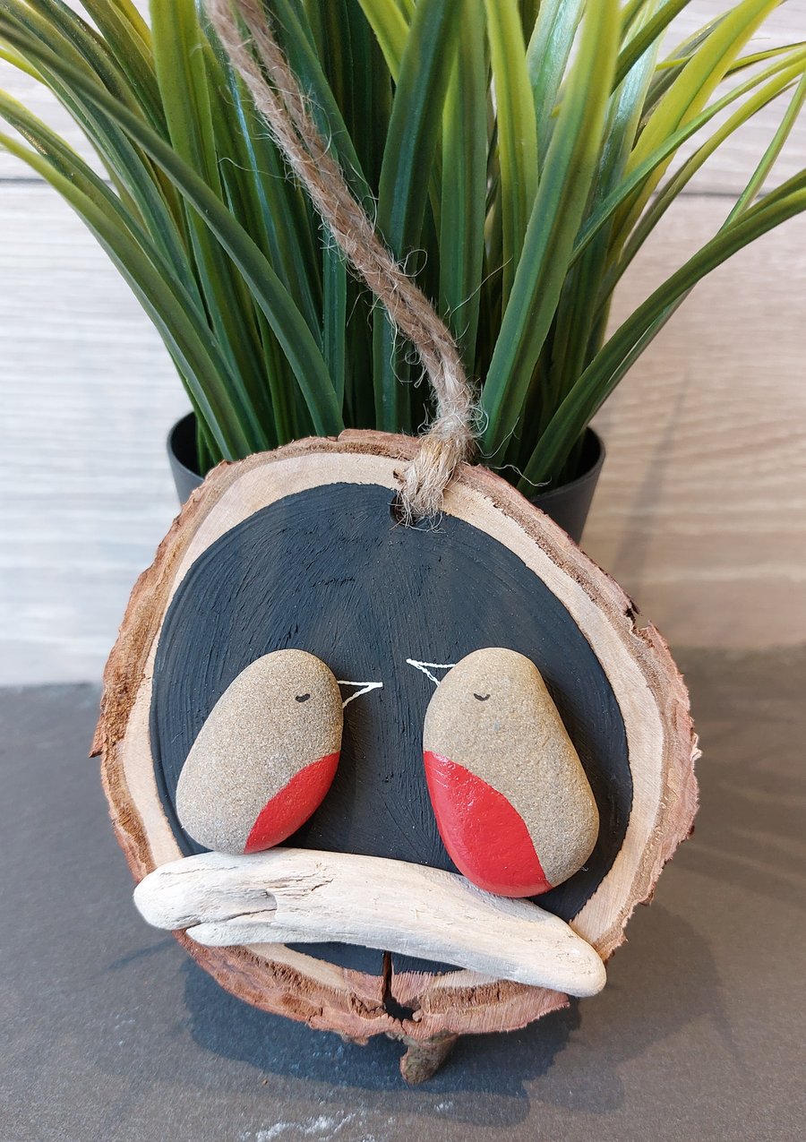Pebble Robins on log slice