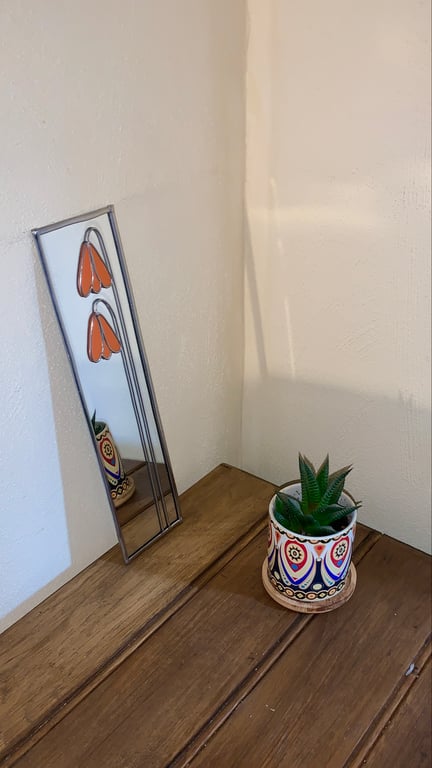 Mirror. Art nouveau flower design.