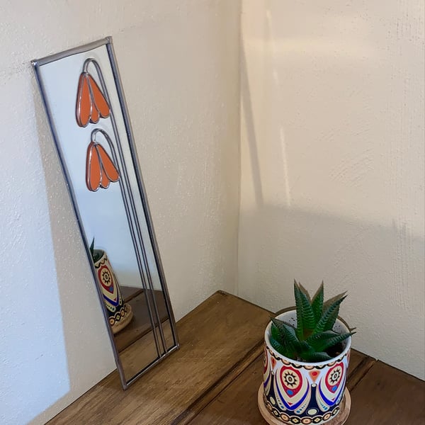 Mirror. Art nouveau flower design.