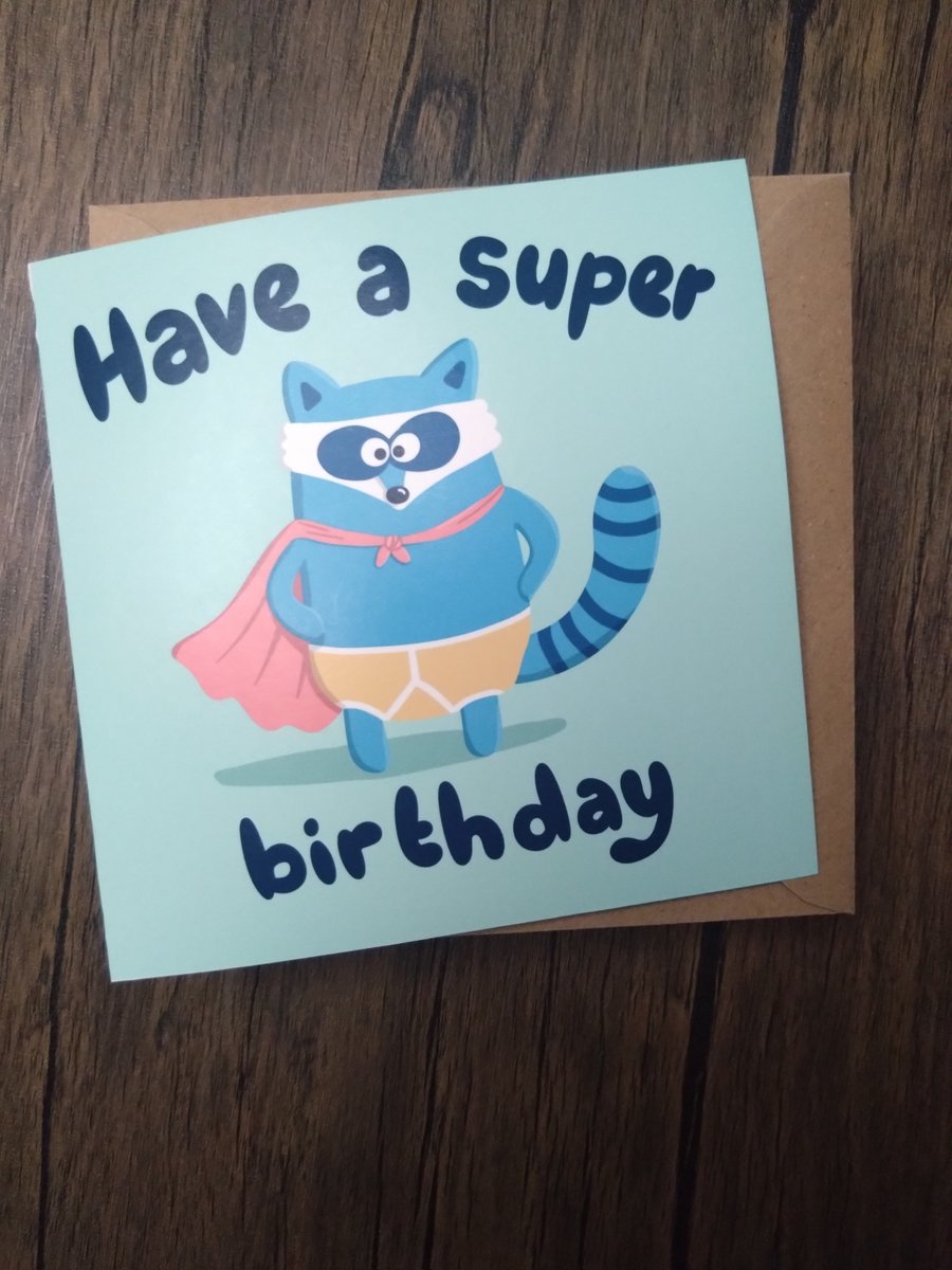Superhero raccoon birthday card