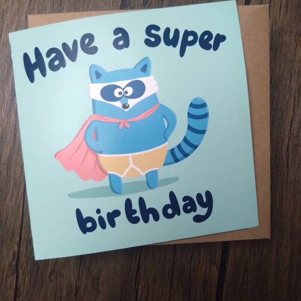 Superhero raccoon birthday card