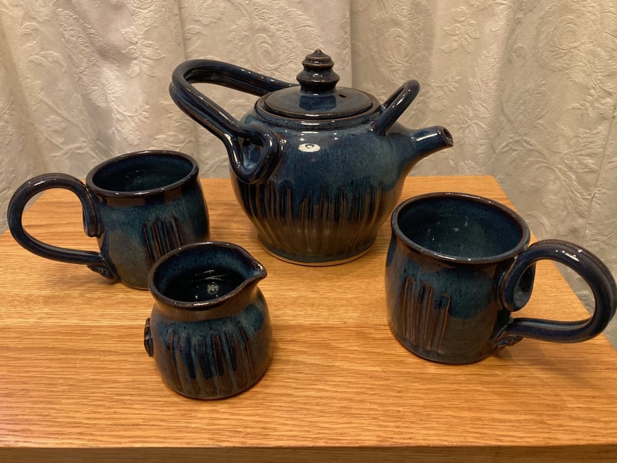 Tea for two!  Teapot, 2 mugs and pourer
