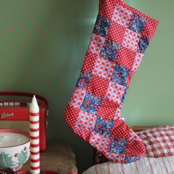 Patchwork stocking made from blue and red Liberty berry and star fabrics 