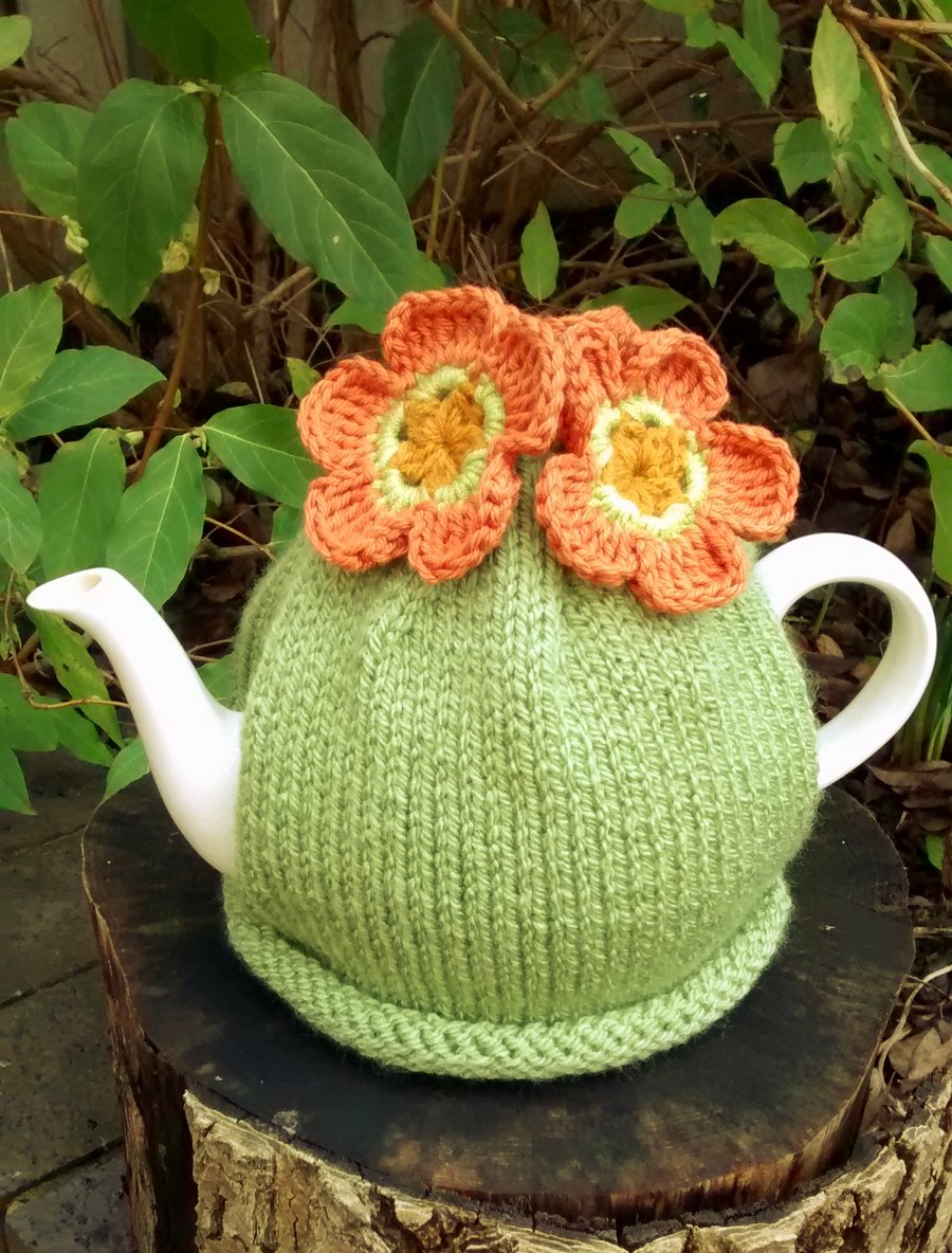 Green Summer Tea Cosy With Orange Crochet Flowers