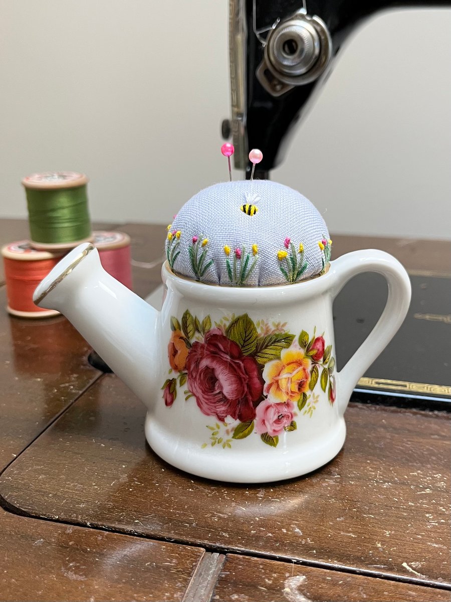 Pin cushion in repurposed china watering can embroidered flowers and bee