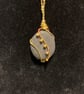 Beautiful wire wrapped pebble pendant on gold coloured chain.  - Image 3