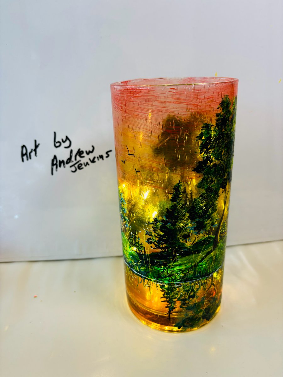 A hand painted and fired glass vase by Andrew Jenkins 