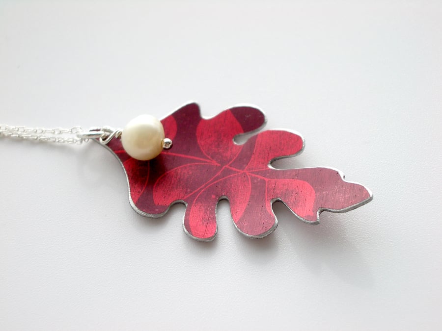 Oak leaf necklace with acorn pearl in plum and red