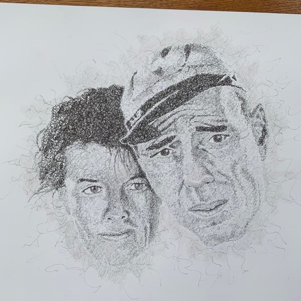 A portrait of Bogart and Hepburn