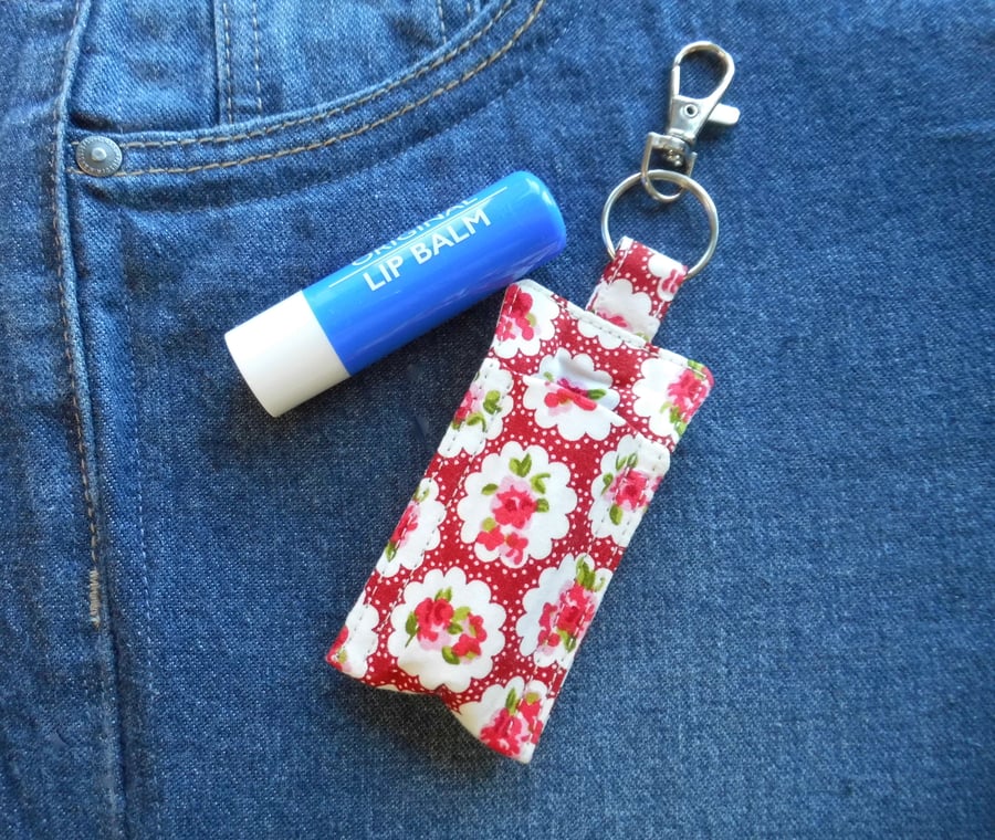 Key ring lip balm holder in red floral fabric keyring 