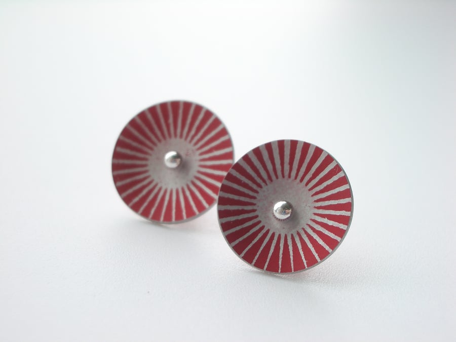 Red circle studs with sunburst print